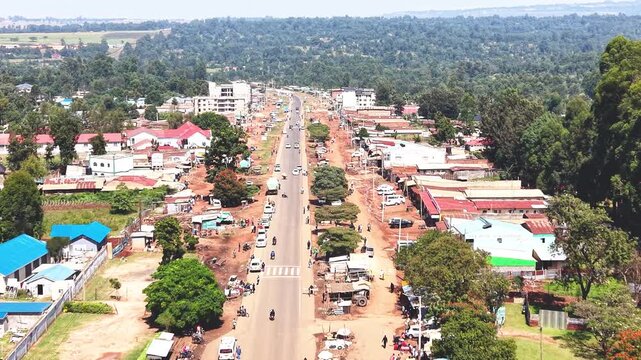 Communication mask, telecommunication Aerial wide shot of showing modern skyline of Rural kenya settlement with old architectures in background and poor ghetto suburb district of Kibera.