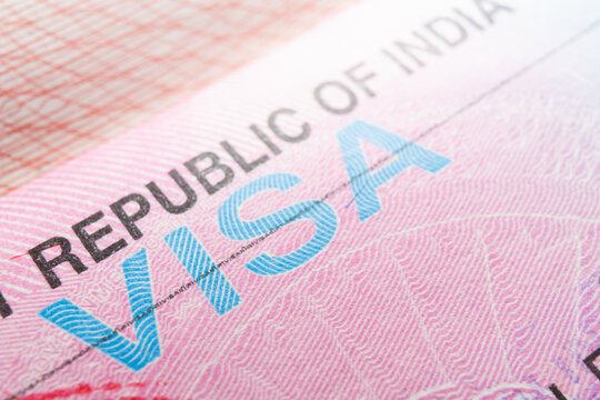 Macro close-up of an Indian visa stamp in a passport with copy space Visa in passport for world travel, Indian visa. High quality