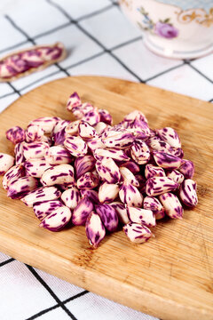 Fresh Purple Speckled Beans on Wooden Cutting Board Kitchen Food Preparation