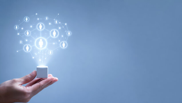 Precision esg supply chain tracking concept with digital network icons floating above hand holding small white cube on blue background