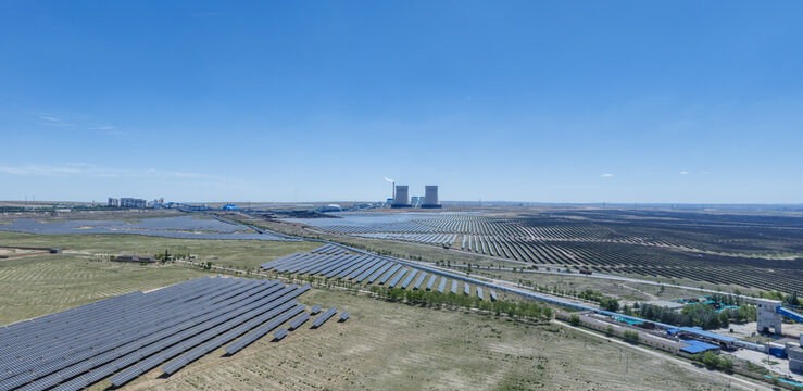 Aerial View of Solar Photovoltaic Power Station and Coal-Fired Power Plant at Energy Base