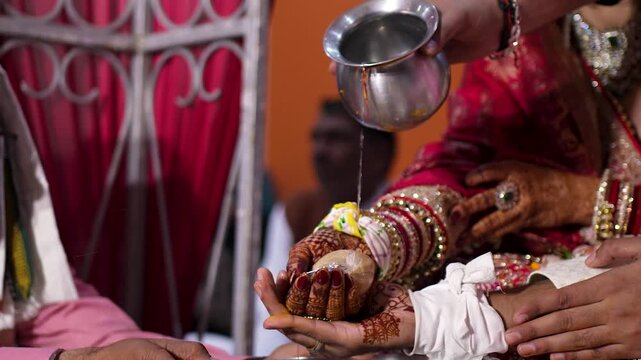 Traditional Indian Wedding Ritual with Water Offering