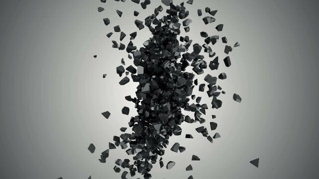 Abstract black cube forms crack apart and explode into many polygonal pieces drifting through space against a soft gray backdrop in a clean minimalist 3D animation
