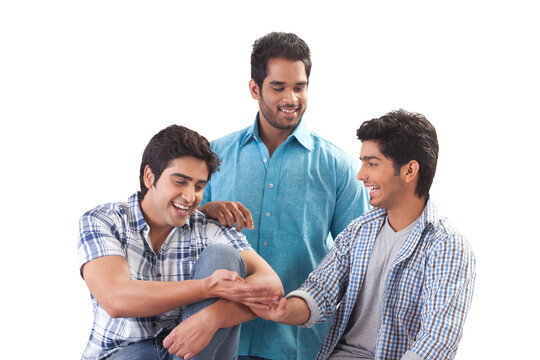 Three friends laughing