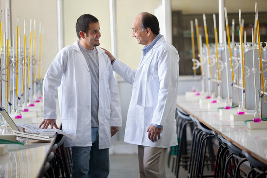Student and professor in laboratory