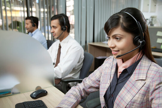 Female executive working on computer