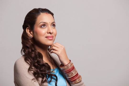 Married woman with bangles looking up