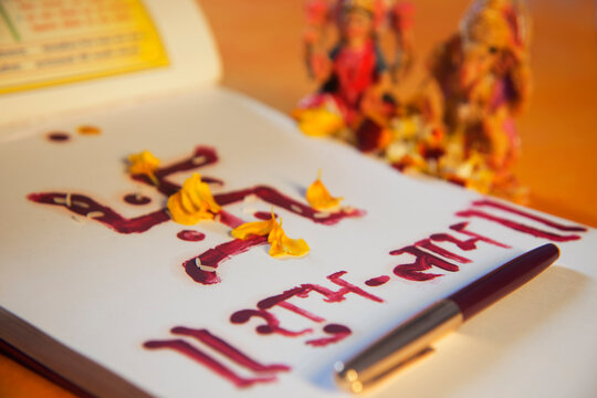 Lakshmi puja with ledger book and a pen