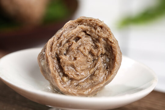 Handmade Teochew Beef Balls in Clear Soup - Traditional Chinese Cuisine Meatballs on White Plate