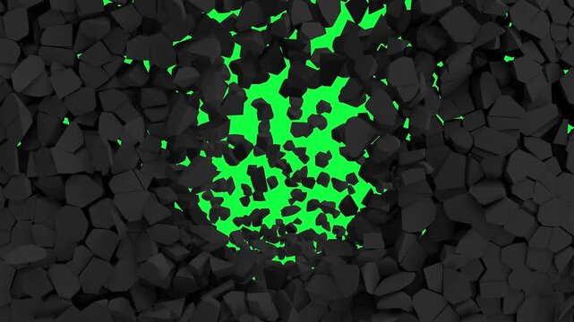 Dark polygonal rock fragments break apart and move outward, exposing a bright green illuminated center in an abstract destruction scene, 3D animation