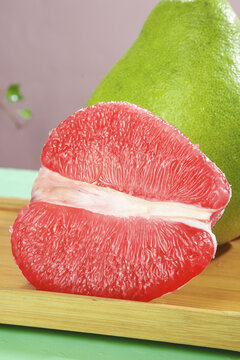 Thai Ruby Red Pomelo Citrus Fruit Segment on Wooden Board - Fresh Tropical Fruit