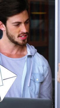 Man discussing with his coworker while holding a laptop 4k