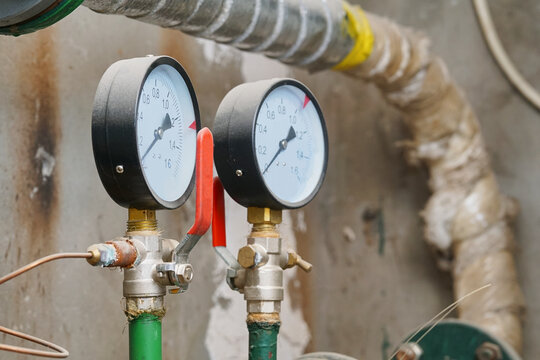 Two water pressure gauge meter on pipe,shut off in basement