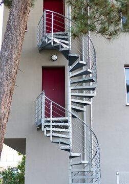 Metal spiral staircase outside the building