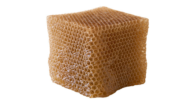 Honeycomb cube with hexagonal cells filled with golden honey
