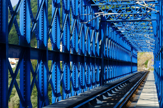 Steel Lattice Railway Bridge Truss and Train Tracks Crossing River