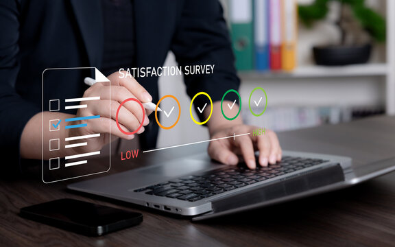 Business professional completing a virtual satisfaction survey with rating scale and checklist for customer feedback, service quality evaluation, experience measurement, and improvement.
