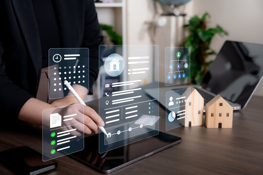 Business professional managing a virtual property dashboard with tenant records, scheduling, team structure, document checks, and performance data for efficient real estate administration.
