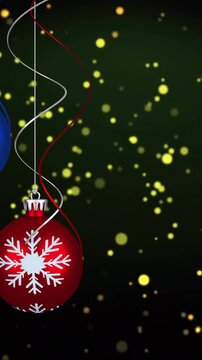 Animation of yellow spots over christmas baubles