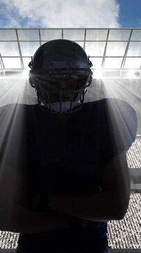 Animation of american football player over sports stadium