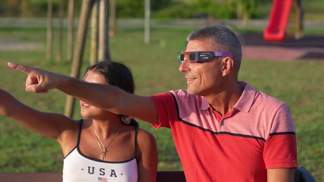 Family members observing total solar eclipse during