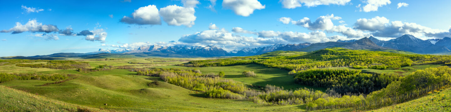Panoramic view of green hills and mountains in Pincher Creek Alberta
