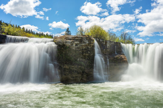 Lundbreck falls water flowing over rock formations in Alberta, Canada