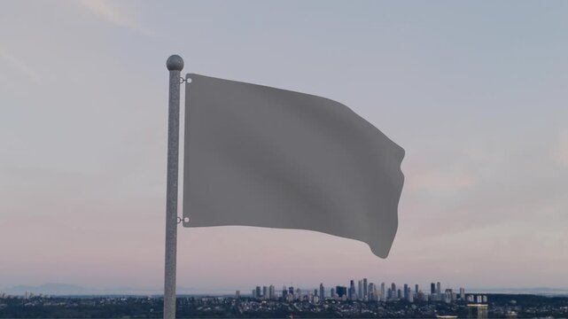 A plain gray flag waves gently in the breeze against a soft pastel sky with a city skyline in the background, perfect for logo reveal