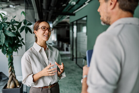 Business people having a meeting in the office. Teamwork and success concept, portrait of a smart young basian businesswoman