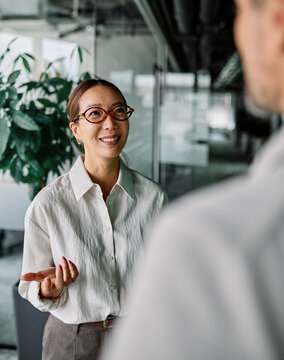 Business people having a meeting in the office. Teamwork and success concept, portrait of a smart young basian businesswoman