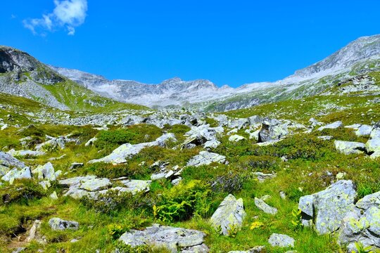 Rock covered landscape bellow a mountain peak at P&ouml;llatal high alpine valley in High Tauern, Carinthia, Austria