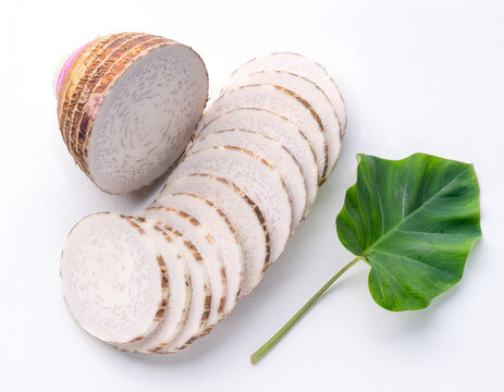Fresh taro vegetable with green leaf on white background