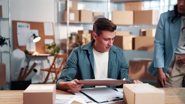 Man, multitask and logistics worker in office with distribution, shipping or delivery deadline. Stress, timelapse and supply chain manager with overwhelming workload for documents, boxes or clipboard