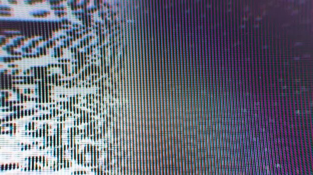 Colorful wavy CRT glitch lines on dark background, analog signal distortion macro close-up.