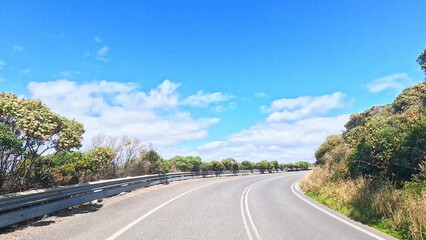 Fototapeta premium Winding Asphalt Road Along the Great Ocean Road in Australia