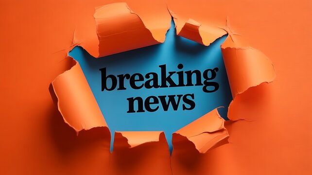 Breaking news text revealed through a torn orange paper hole against a blue background, conceptual media alert for urgent information updates