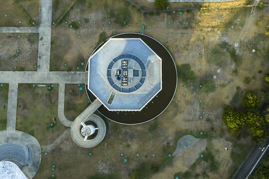 Aerial view of the iconic triangular lighthouse at Ponta do Seixas, surrounded by landscaped grounds, walkways, and a circular pool in Joao Pessoa, State of Paraiba, Brazil.