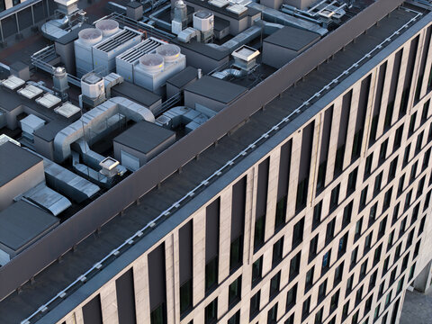 Aerial view of modern office building rooftop featuring HVAC systems and ventilation ducts in Krakow, Lesser Poland Voivode, Poland.