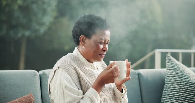 Patio, thinking and woman with coffee in morning for wellness, reflection and start day in house. Break, mature and African person with drink for positive mood, peaceful weekend and relax outdoor