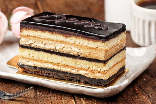 Opera cake is a cake originating from France, this cake is layered, and the layers consist of, almond sponge cake or commonly called joconda in French 
