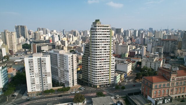 Aerial view of the Luz district featuring dense urban architecture, high-rise residential buildings, and the historic Estacao da Luz in Sao Paulo, State of Sao Paulo, Brazil.