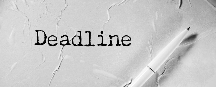 Sticker paper with word DEADLINE