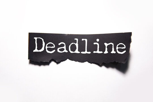 Sticker paper with word DEADLINE
