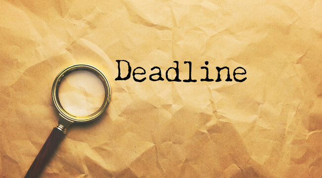 Sticker paper with word DEADLINE