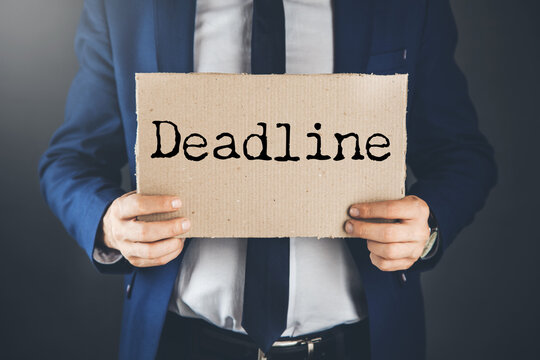 Sticker paper with word DEADLINE
