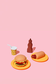 Toy fast food meal sits on a pink background with copy space
