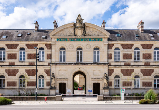 Cherbourg, France - July 20, 2026: Front view of the main facade of the Louis Pasteur Hospital open in 1860, part of the Cotentin Public Hospital Center, on a sunny day.