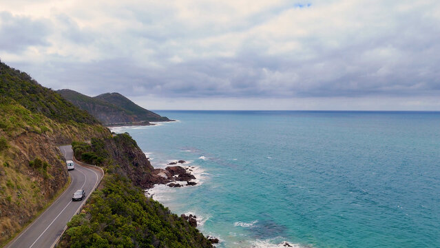 Aerial View of Cars Driving Along the Great Ocean Road
