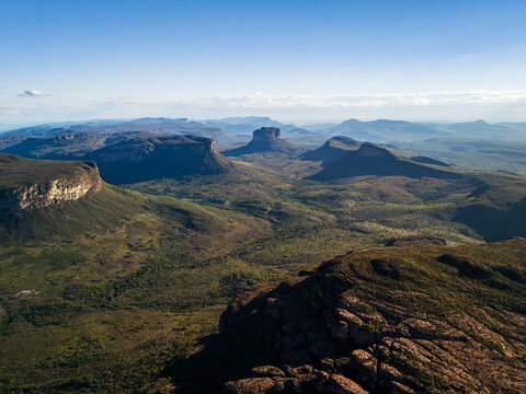 Aerial view of the dramatic table mountains and lush green valleys of Chapada Diamantina in Andarai, State of Bahia, Brazil.