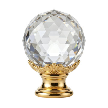 A decorative furniture knob featuring a large multifaceted clear crystal sphere mounted on a polished gold base on a black background isolated on a transparent background